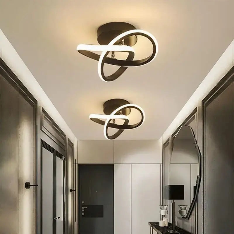 Modern black and white DecorBites LED ceiling lights with sleek intertwined ring design for living room and balcony lighting