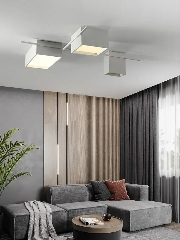 Modern minimalist decorbites led ceiling light with three white acrylic panels and metallic arms for living rooms