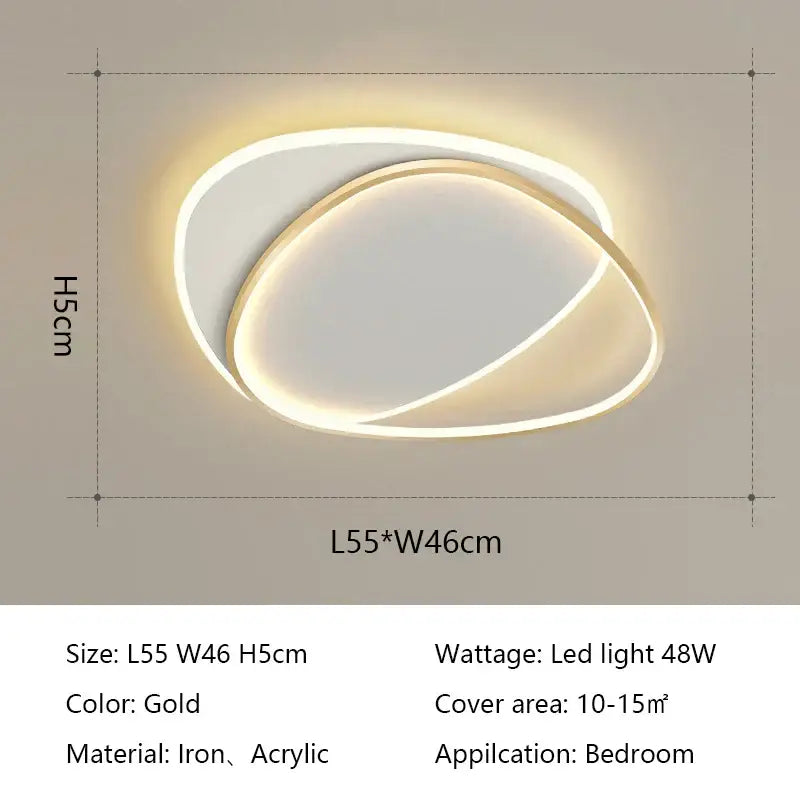 Gold-colored decorbites led ceiling light with two overlapping iron and acrylic oval rings for bedroom use