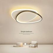 Modern decorbites led ceiling lights featuring two concentric oval rings in white glow and dark metallic frame for indoor use