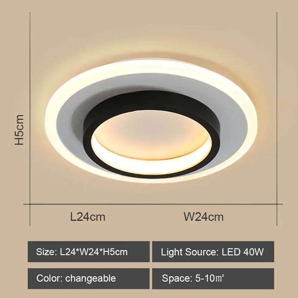 Modern circular black and white decorbites led ceiling light emitting warm ambient illumination for living rooms