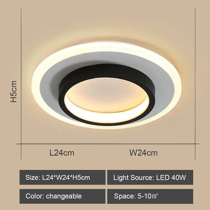 Modern circular black and white decorbites led ceiling light emitting warm ambient illumination for living rooms