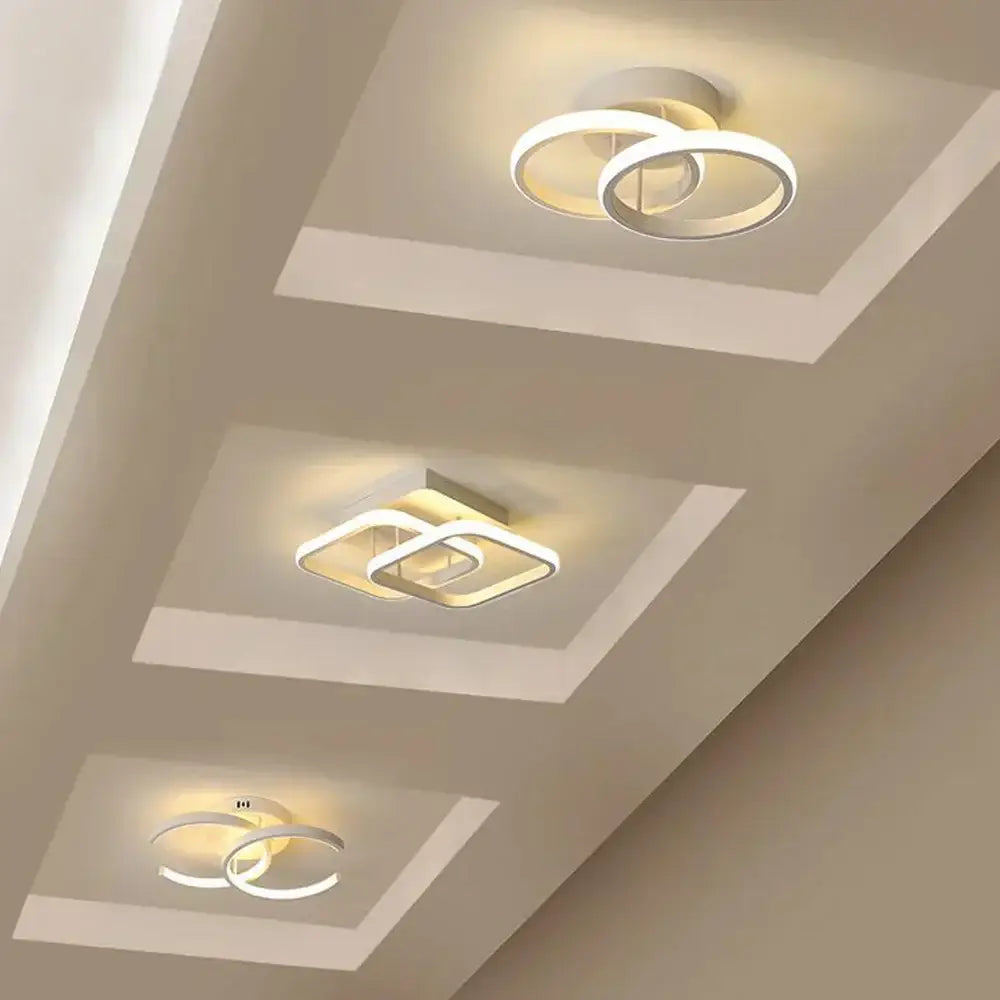 Modern minimalist decorbites led ceiling lights with sleek white rings and square frames emitting warm glow
