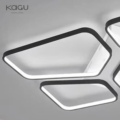 Modern black-framed decorbites led ceiling light with sleek geometric design and bright white illumination for living rooms