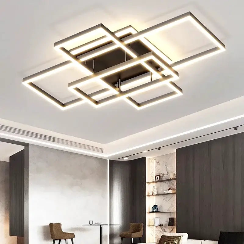 Modern geometric decorbites led ceiling light with metallic intersecting frames emitting warm ambient illumination for indoor use