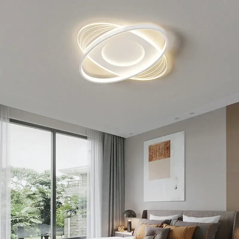 Modern white DecorBites LED ceiling light with concentric circular rings and glowing inner circle for living spaces