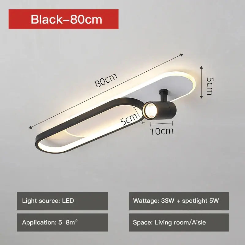 Black DecorBites LED ceiling spotlight with sleek elongated oval design and integrated spotlight for interior lighting