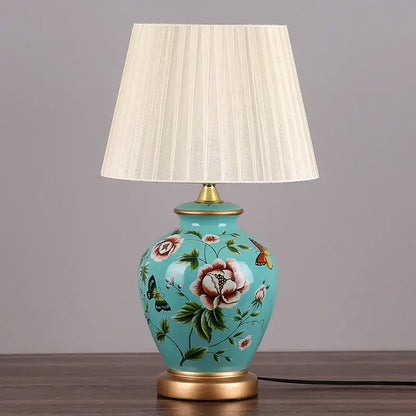 Turquoise decorbites led ceramic table lamp with hand-painted floral motifs and gold trim for living room lighting