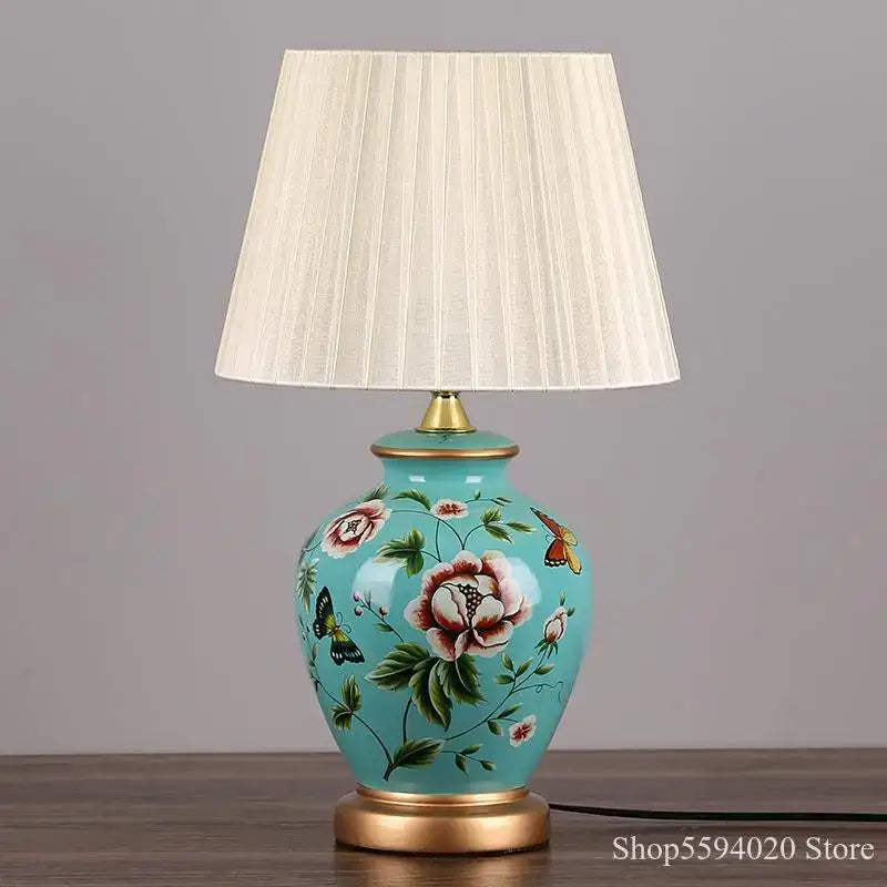 Turquoise decorbites led ceramic table lamp with hand-painted floral butterfly motifs and gold-toned accents for home lighting