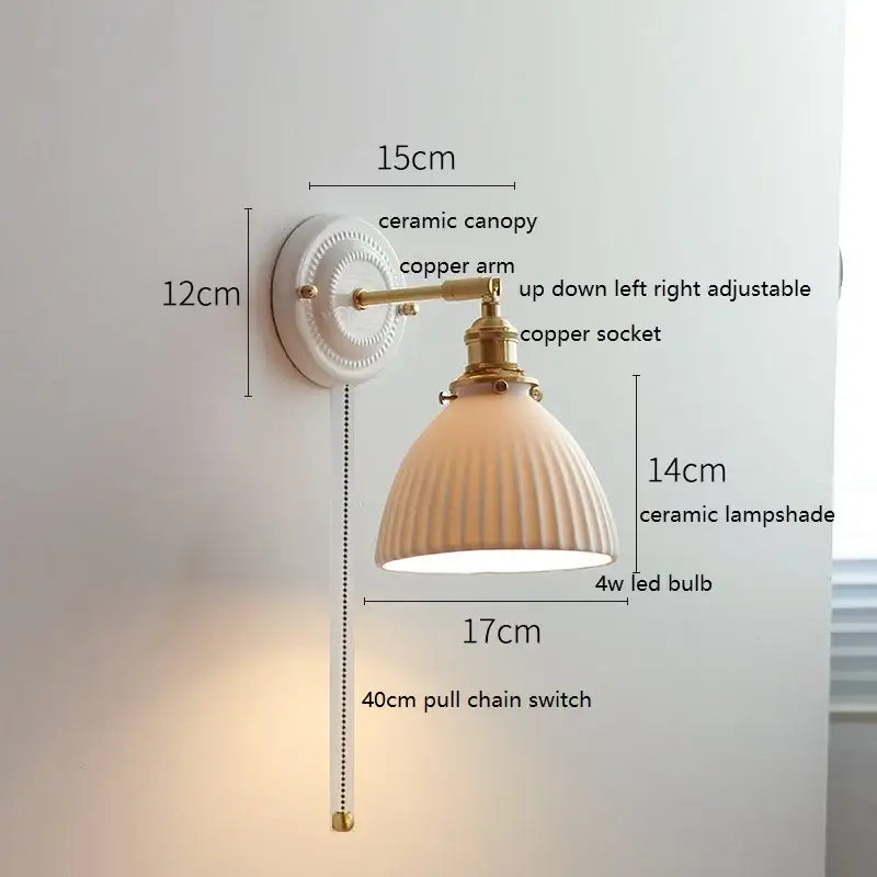 Vintage-style DecorBites LED ceramic wall lamp with white ceramic canopy and copper arm for bedroom and bathroom mirror
