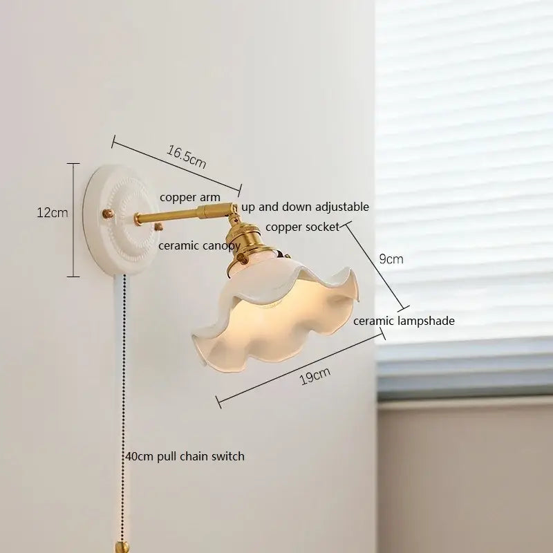 DecorBites led ceramic wall lamp with white ceramic base copper arm and off-white scalloped ceramic lampshade for bedroom