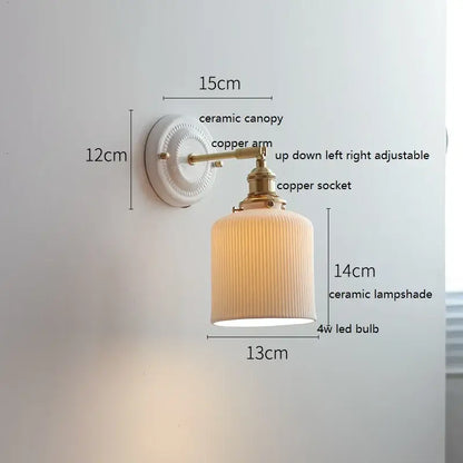Cream-colored ribbed ceramic decorbites led ceramic wall lamp with copper arm and white ceramic canopy for bedroom bathroom mirror
