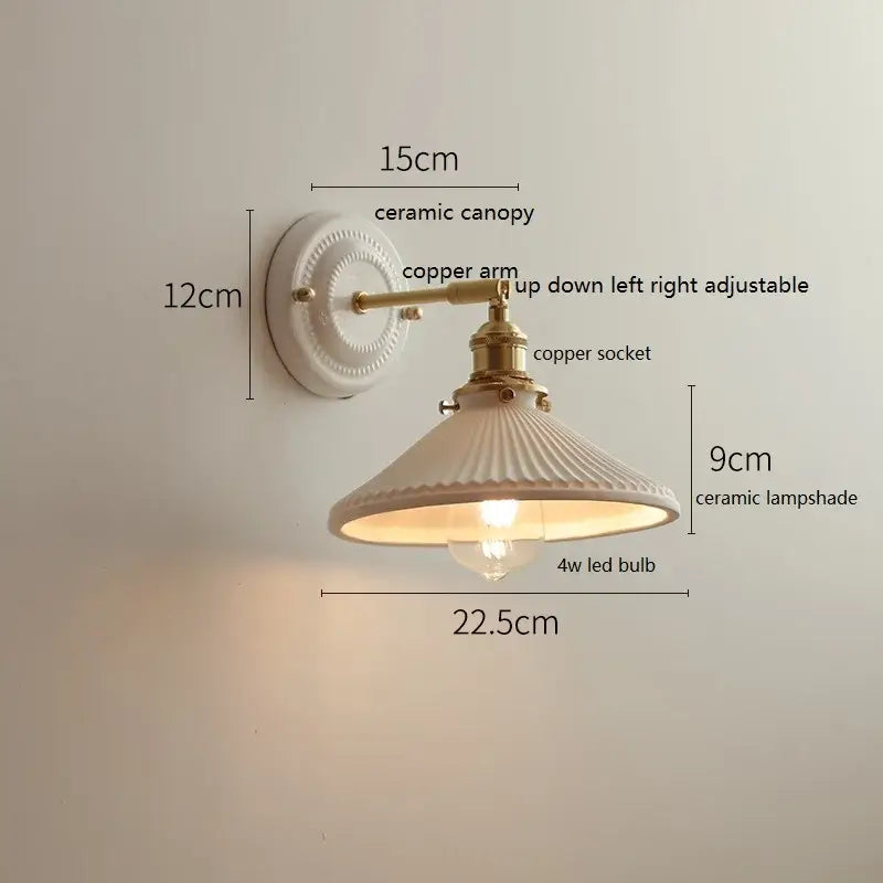 White ceramic decorbites led wall lamp with fluted lampshade and brass-finished copper arm for bedroom or bathroom mirror