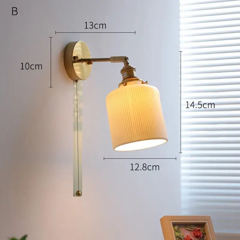 Vintage-style brass decorbites led ceramic wall sconce with ribbed cream glass shade and adjustable pull-chain switch