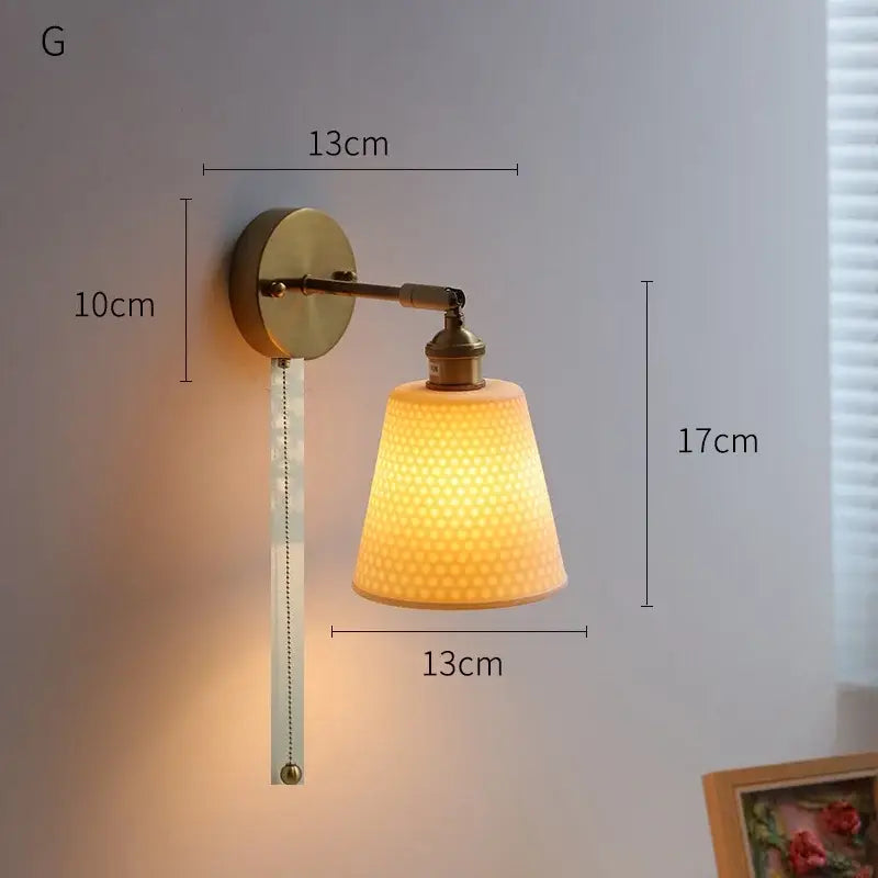 Warm-toned textured glass lampshade with brass arm on decorbites led ceramic wall sconce for bedroom bathroom lighting