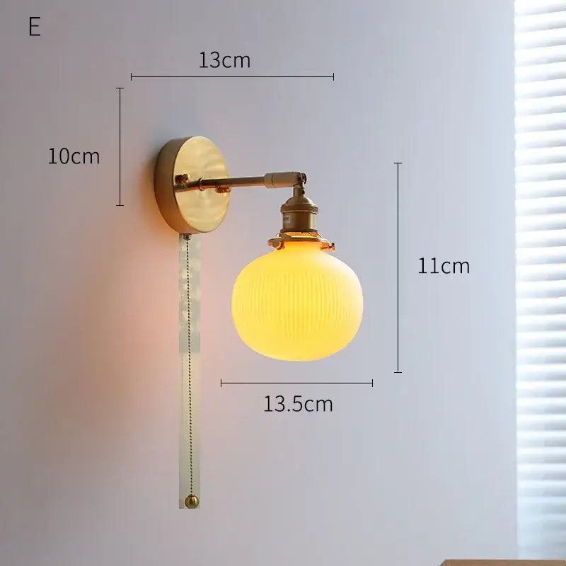 Vintage-style decorbites led ceramic wall sconce with ribbed yellow glass globe and elegant knob switch for mirror lighting