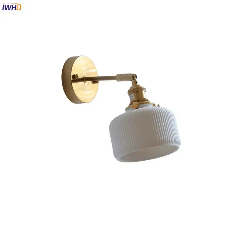 Decorbites led ceramic white ribbed glass wall sconce with brass finish and knob switch for bedroom and bathroom lighting