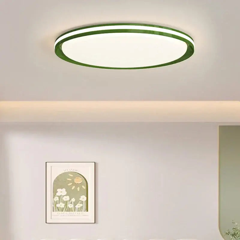 Modern circular decorbites led chandelier with sleek green rim and soft white illuminated center for versatile lighting