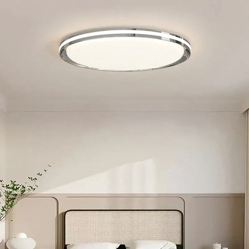 Modern circular decorbites led chandelier with sleek chrome frame and soft white panel for versatile indoor lighting