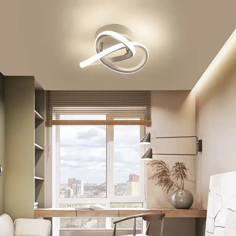 Modern white led ceiling light with sleek intertwined rings in decorbites led chandelier black white design
