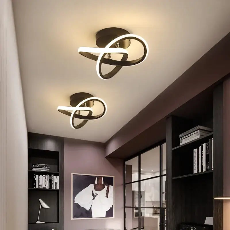 Modern black and white LED chandelier black with sleek intertwined ring design by DecorBites LED chandelier