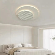 Modern DecorBites LED chandelier ceiling light with a soft glowing ring and wavy textured mirrored panel