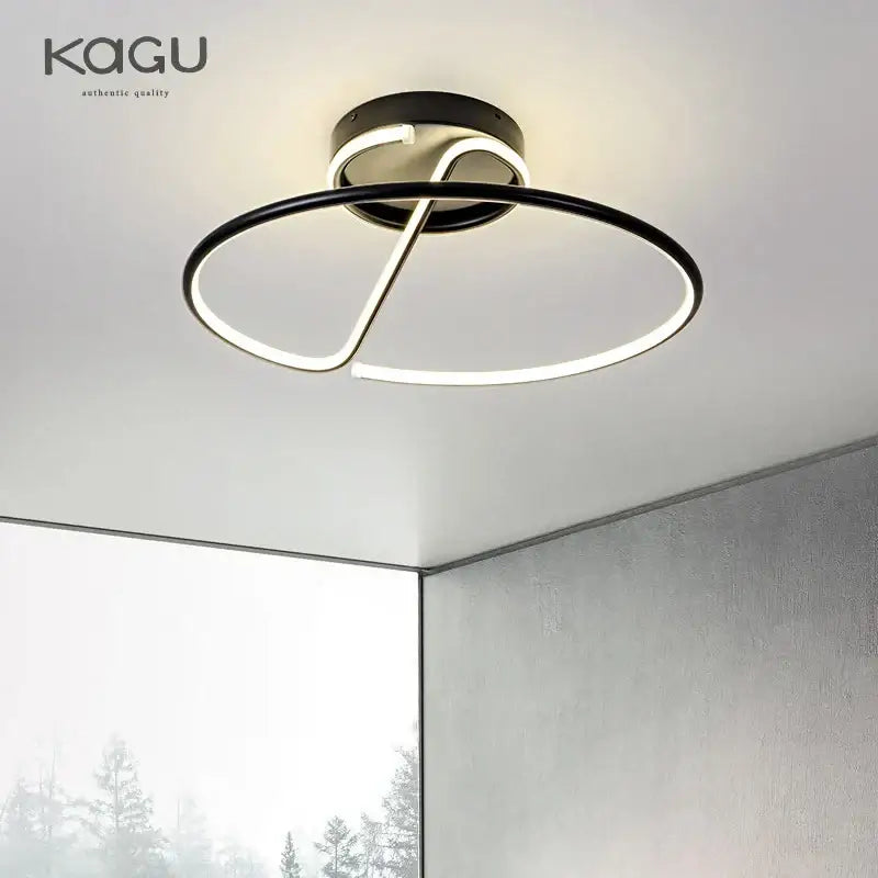 Modern black and white decorbites led chandelier with illuminated circular ring and chrome finish for living room and kitchen
