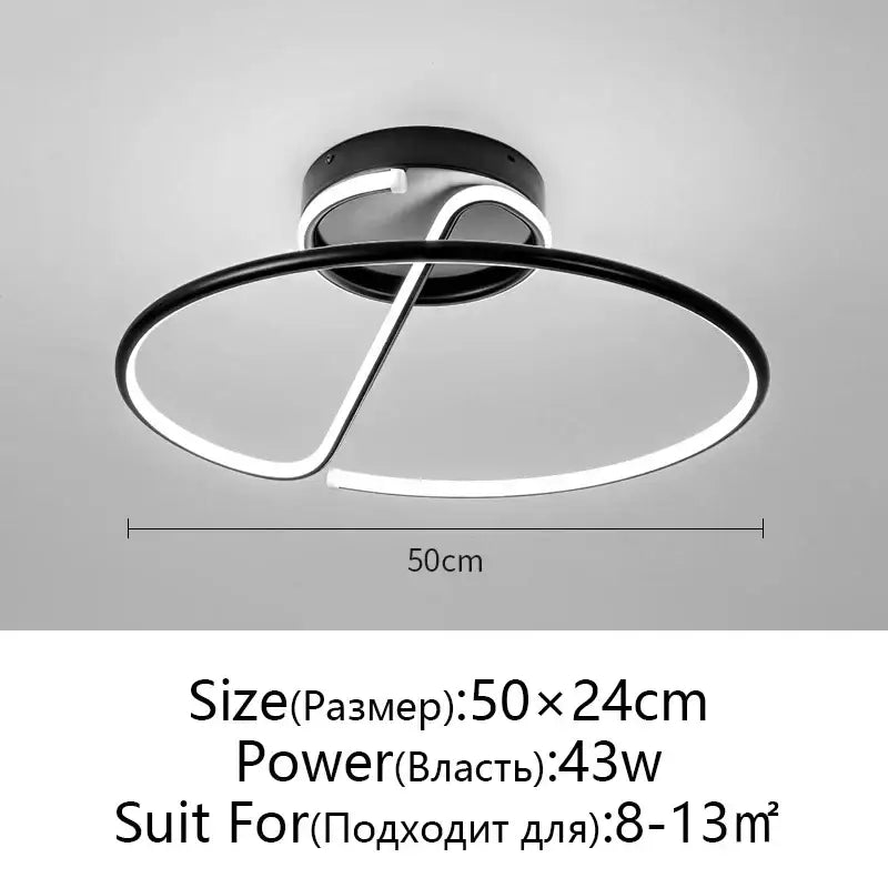Modern black and white decorbites led chandelier with sleek chrome concentric rings for living room and kitchen lighting