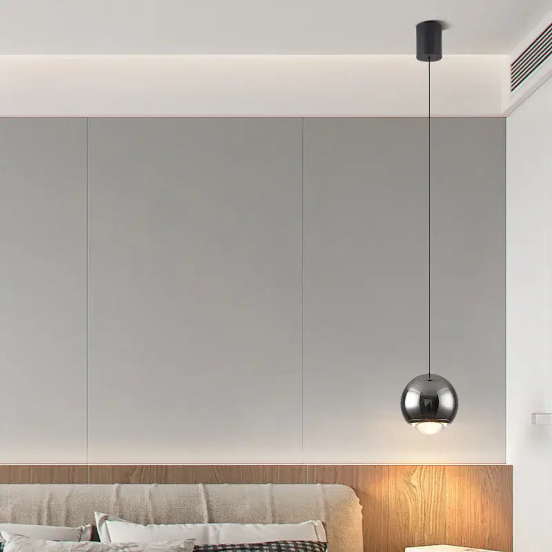 A sleek spherical chrome led chandelier pendant light by DecorBites for bedroom kitchen and study lighting