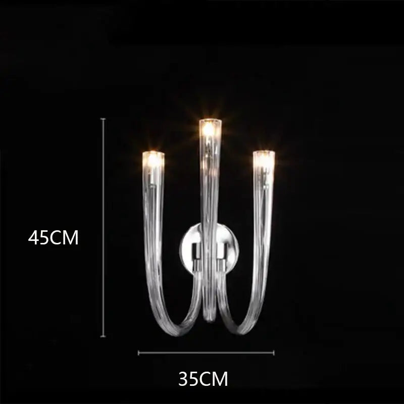Clear glass sconce with three curved arms and chrome backplate for decorbites led chandelier lighting fixture
