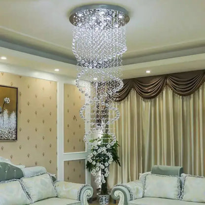 A decorbites led chandelier with a spiral design featuring clear glass beads and a metallic base for luxury lighting