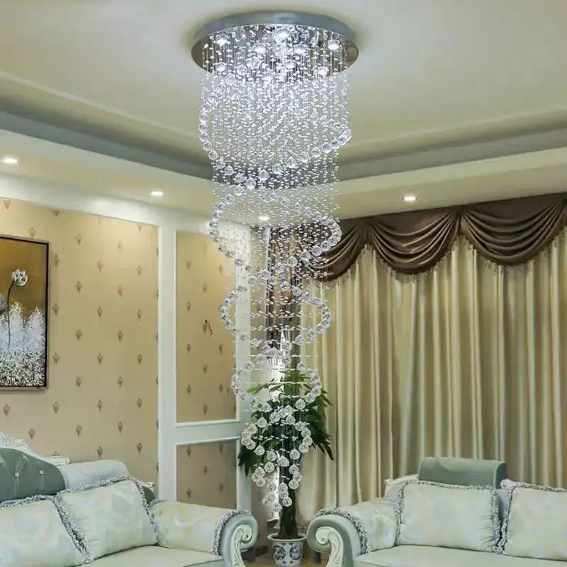 A decorbites led chandelier with a spiral design featuring clear glass beads and a metallic base for luxury lighting