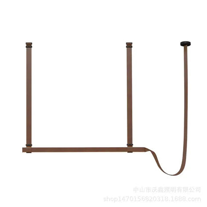 Brown leather belt style hanging rack with three vertical straps and horizontal bar shown with decorbites led chandelier