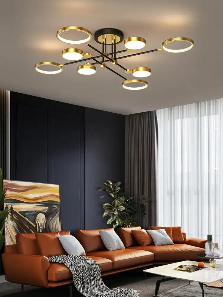Modern gold-toned decorbites led chandelier with black frame brightness adjustable for living and dining room lighting