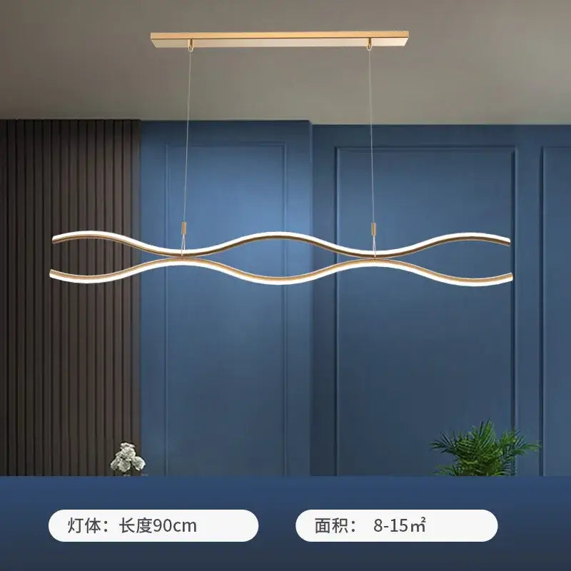 Modern gold-toned decorbites led chandelier pendant light with sleek wavy design and two illuminated parallel bands for dining