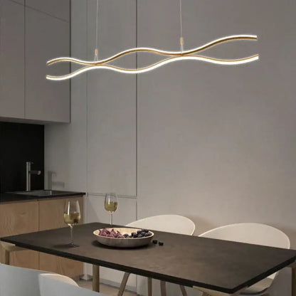 Gold-toned wave-shaped DecorBites LED chandelier pendant light with sleek modern design for dining and bar tables