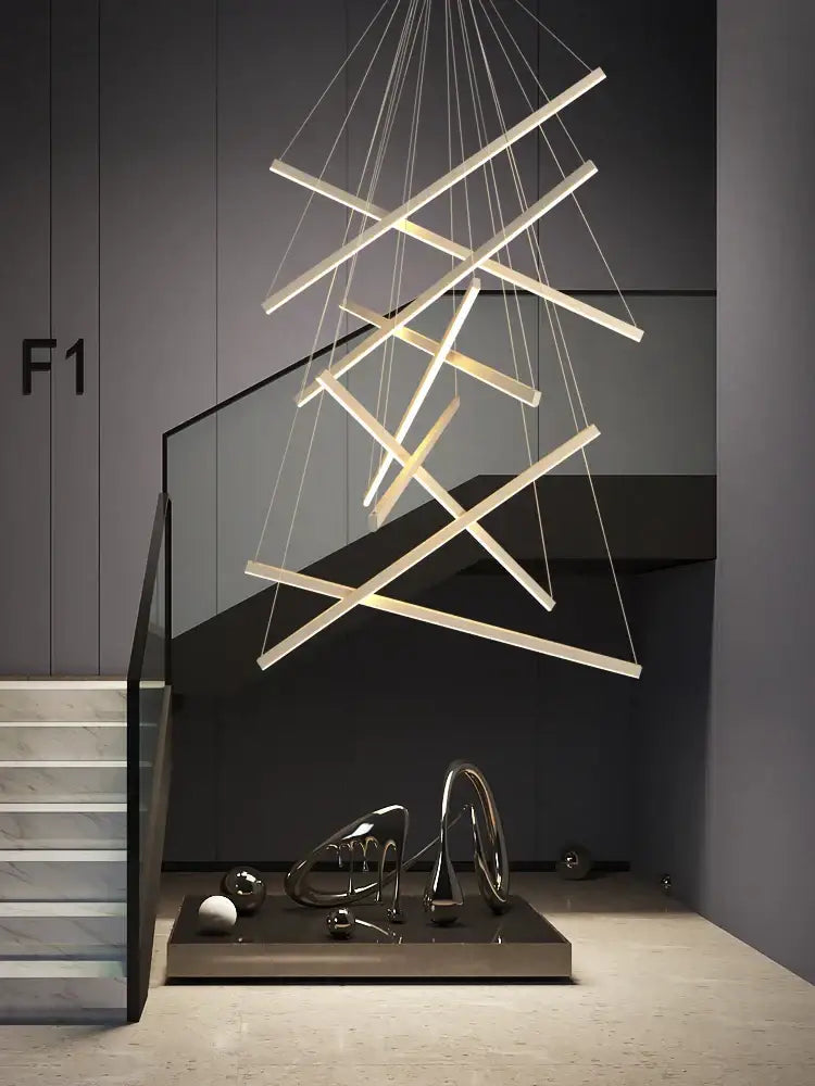 Modern geometric decorbites led chandelier with intersecting white led light bars for loft and duplex interiors
