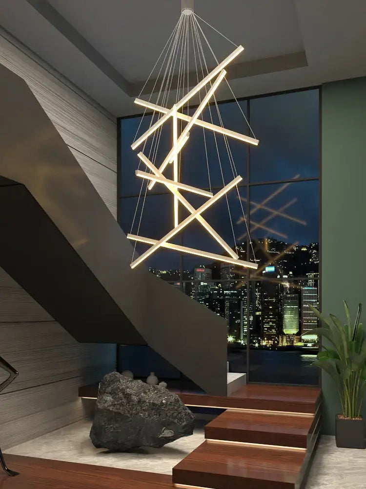 Modern geometric decorbites led chandelier with illuminated led bars suspended by thin cables for loft and duplex interiors