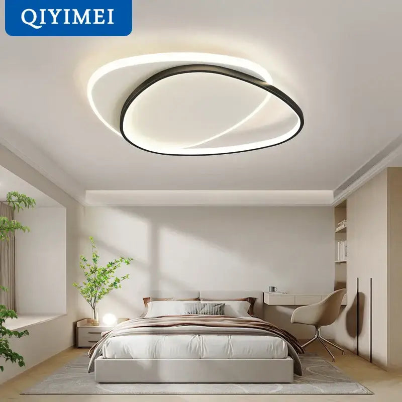 Modern minimalist decorbites led chandelier with black and white rings emitting soft glow for indoor lighting