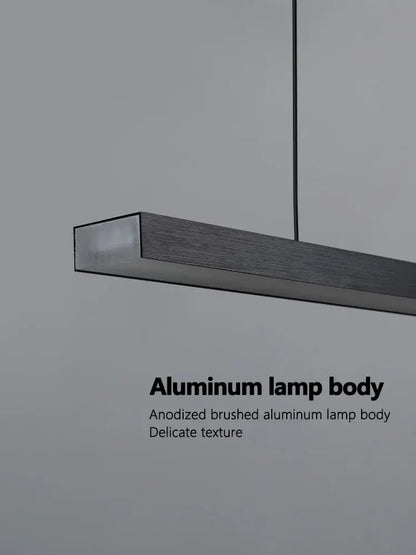 A sleek rectangular anodized brushed aluminum lamp body with textured finish in the decorbites led chandelier design