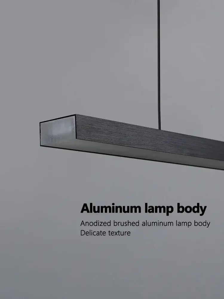 A sleek rectangular anodized brushed aluminum lamp body with textured finish in the decorbites led chandelier design