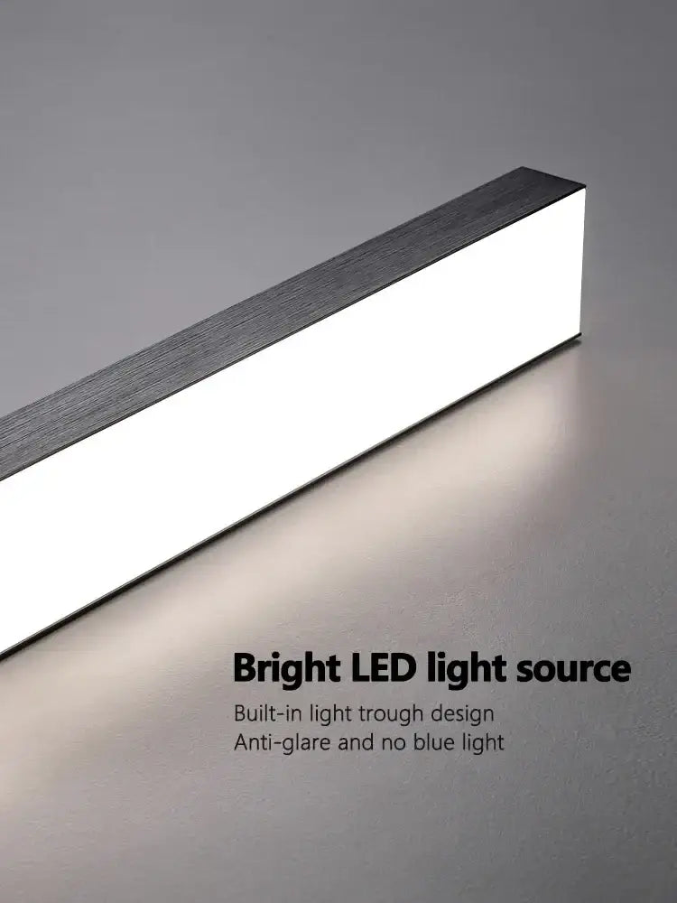 Modern rectangular LED chandelier with sleek black textured edge and bright white light for dining room by DecorBites LED