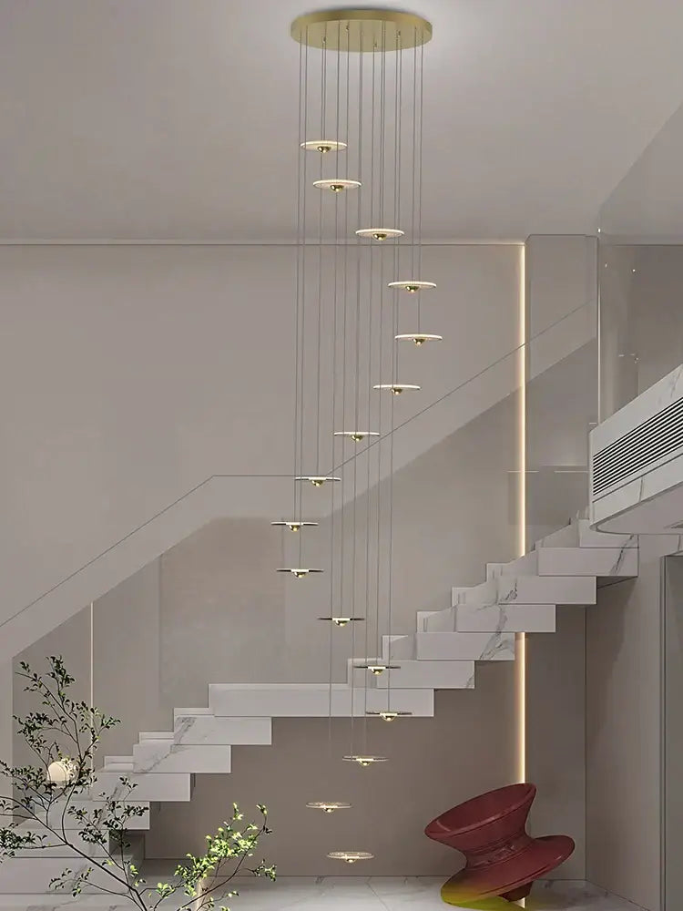 A modern decorbites led chandelier with gold-toned mount and warm white round lights for loft villas and staircases