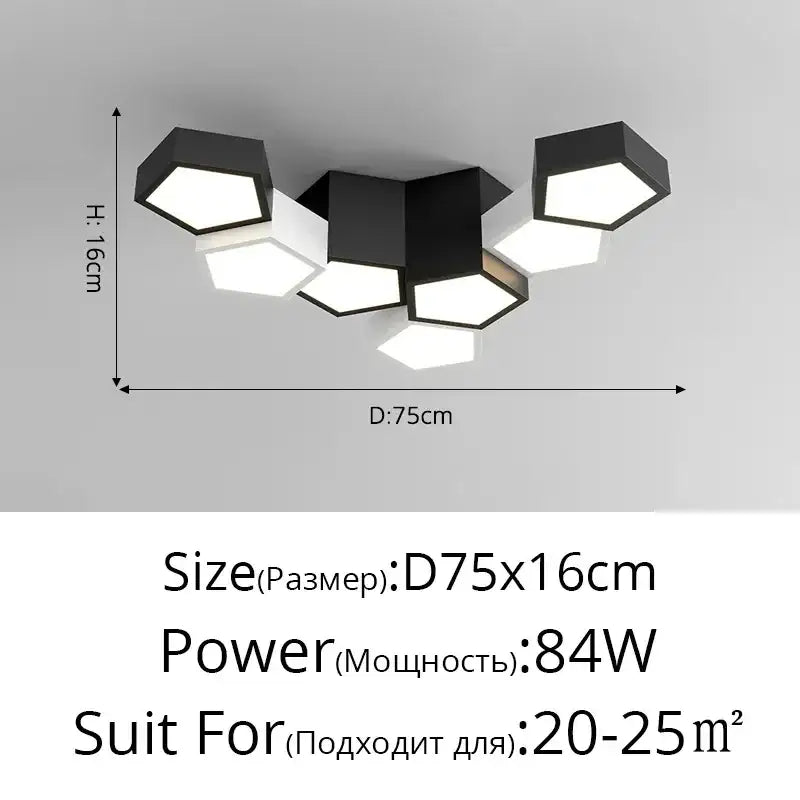 Modern black hexagonal DecorBites LED chandelier with white illuminated panels for minimalist indoor lighting