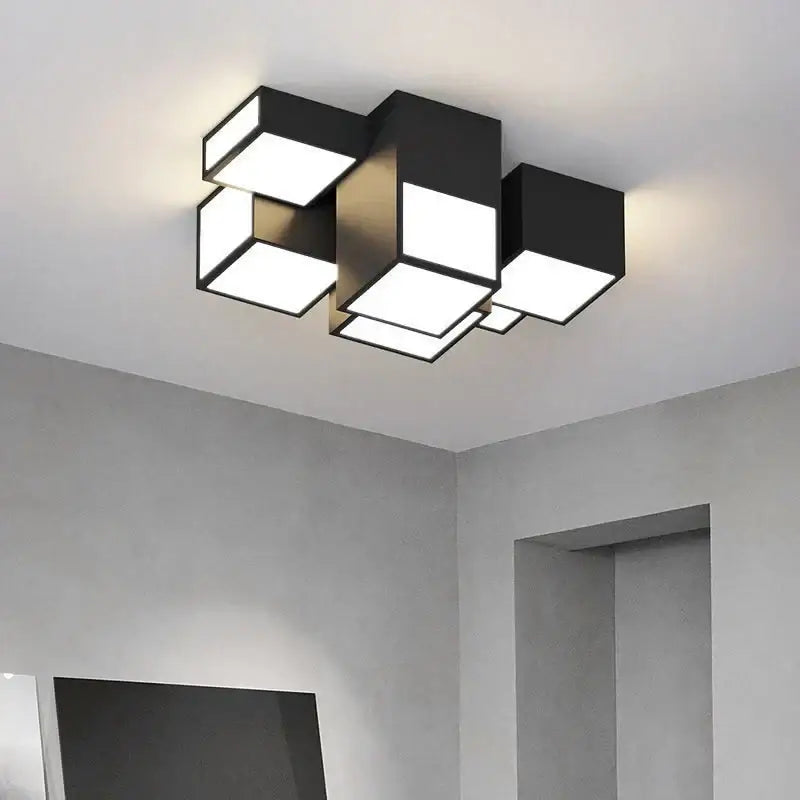Modern black cube decorbites led chandelier with illuminated white panels and remote dimming for minimalist indoor lighting