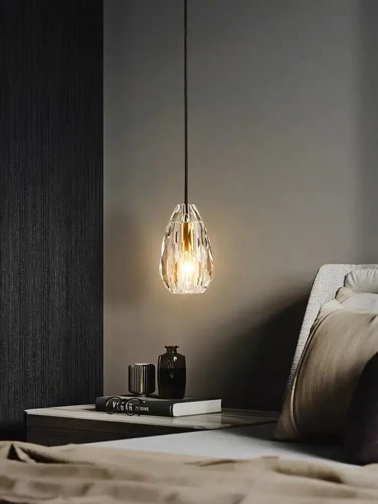 A decorbites led chandelier with a faceted crystal glass shade and warm bulb for dining room lighting