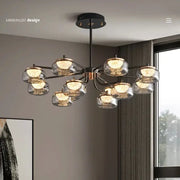 Modern minimalist black metal decorbites led chandelier with clear glass globe shades for living and dining rooms