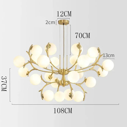 Gold-toned decorbites led chandelier with branching arms and frosted globe lights for living room and dining décor