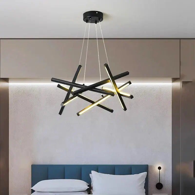 Modern black and gold geometric decorbites led chandelier with intersecting rods for living room and dining room lighting