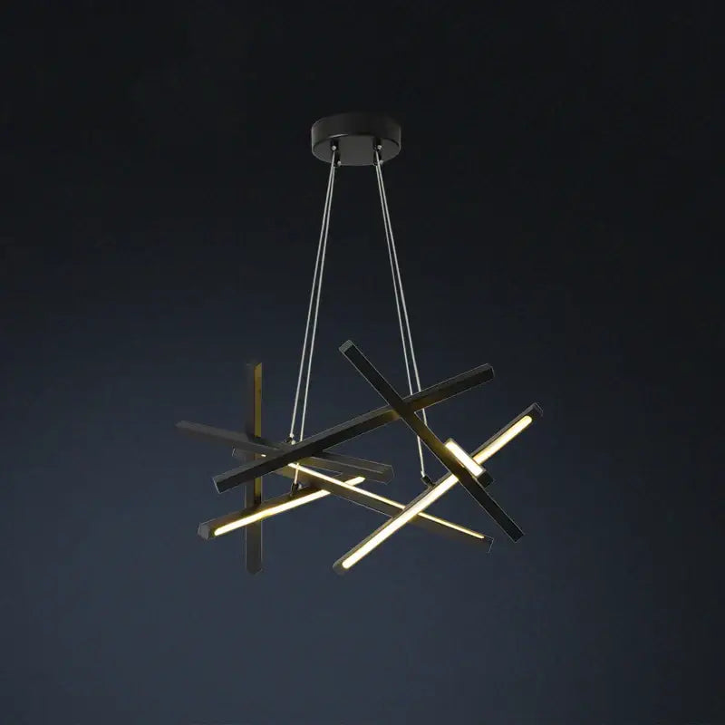 Modern black and gold geometric DecorBites LED chandelier with intersecting LED bars for indoor pendant lighting